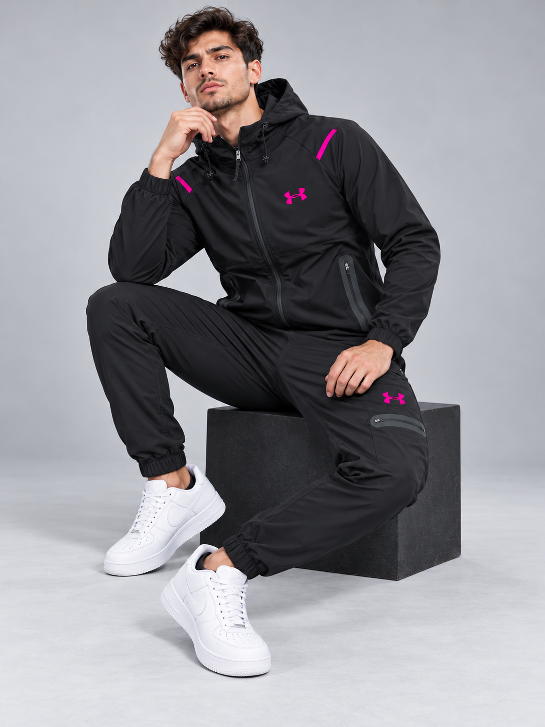 Chándal Under Armour — negro y fucsia