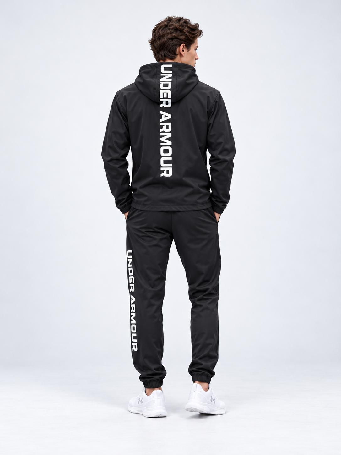 Chándal Under Armour — negro y blanco