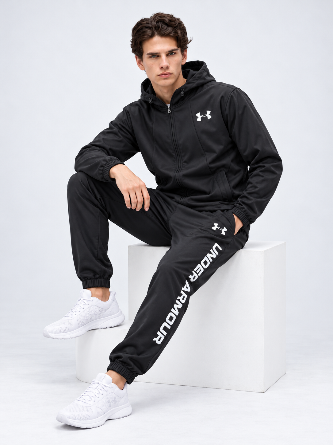 Chándal Under Armour — negro y blanco