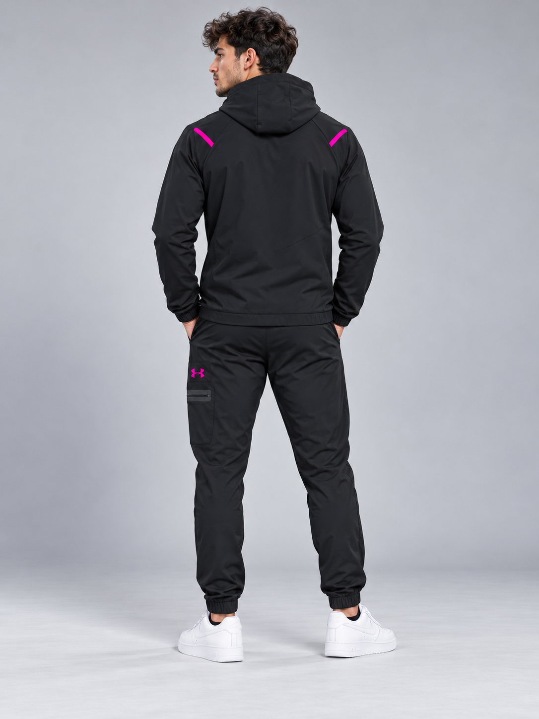 Chándal Under Armour — negro y fucsia