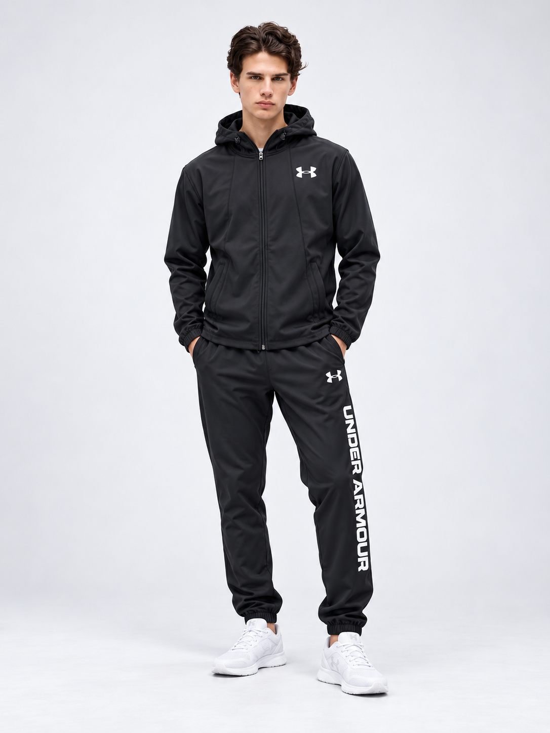 Chándal Under Armour — negro y blanco