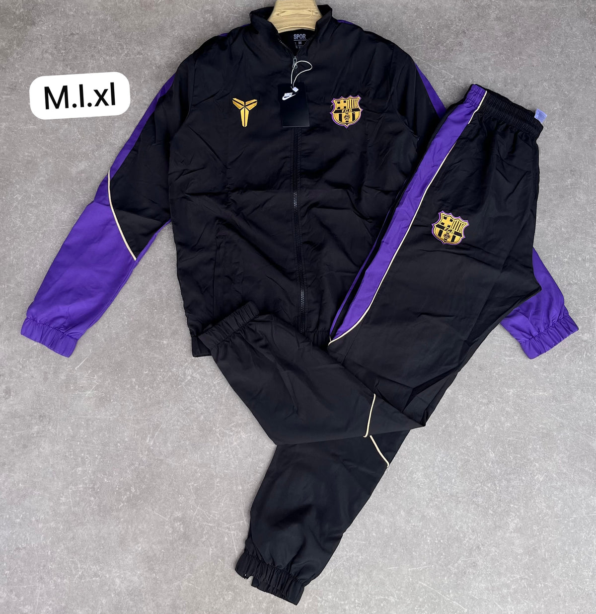Chándal Nike — negro y morado