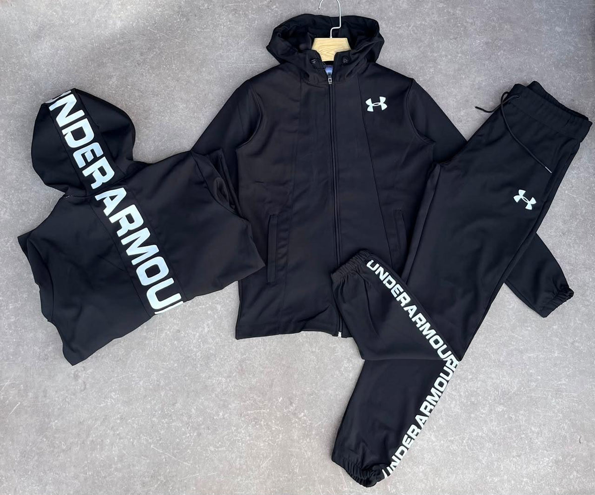 Chándal Under Armour — negro y blanco